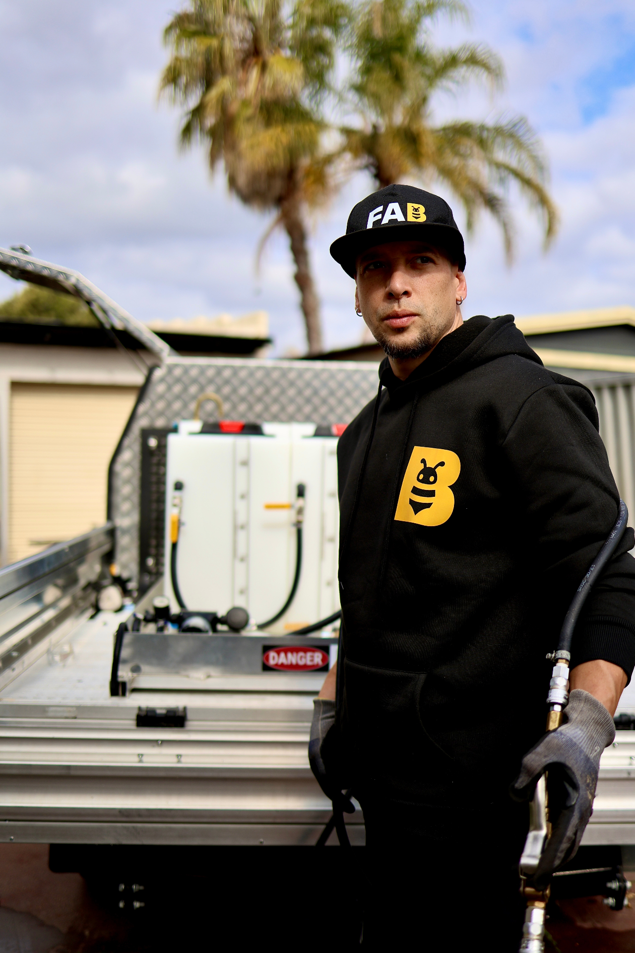Fabien beside the branded FAB Pest Control service vehicle in Perth